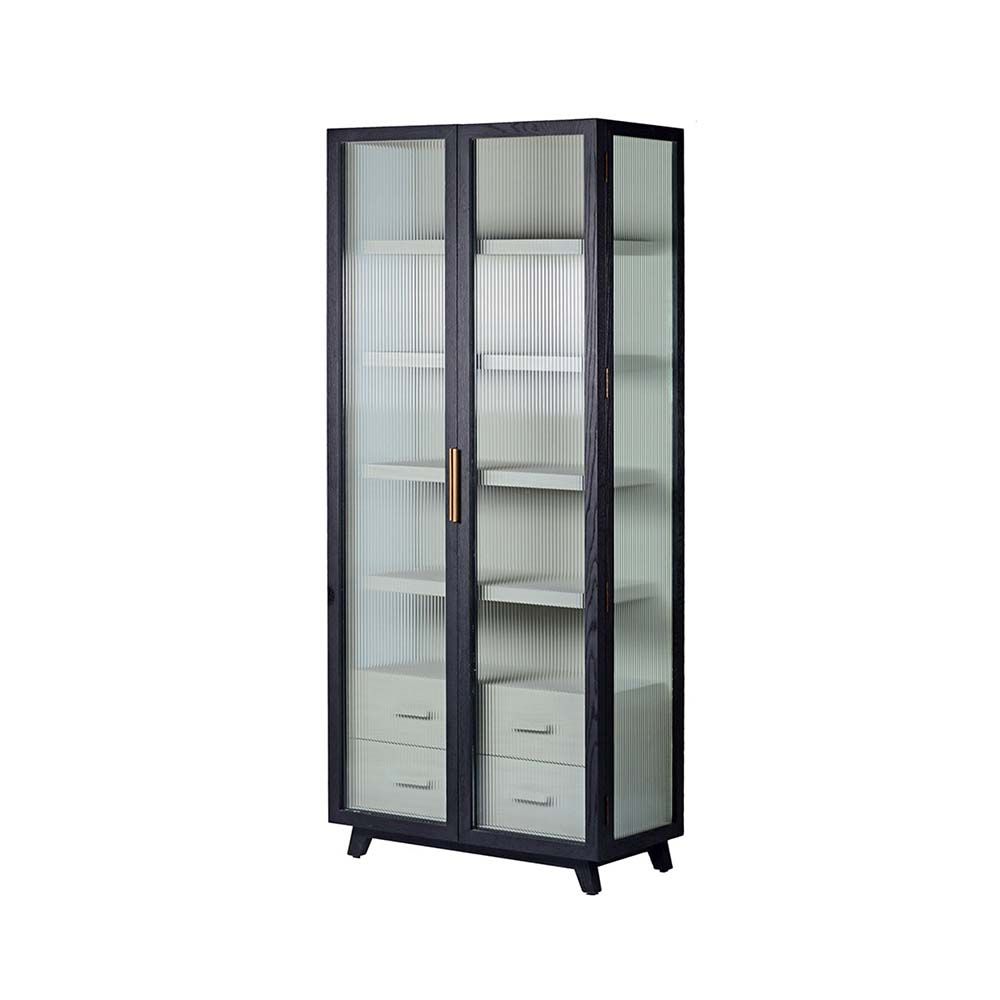 A decadent display cabinet with fluted glass doors and brass handles