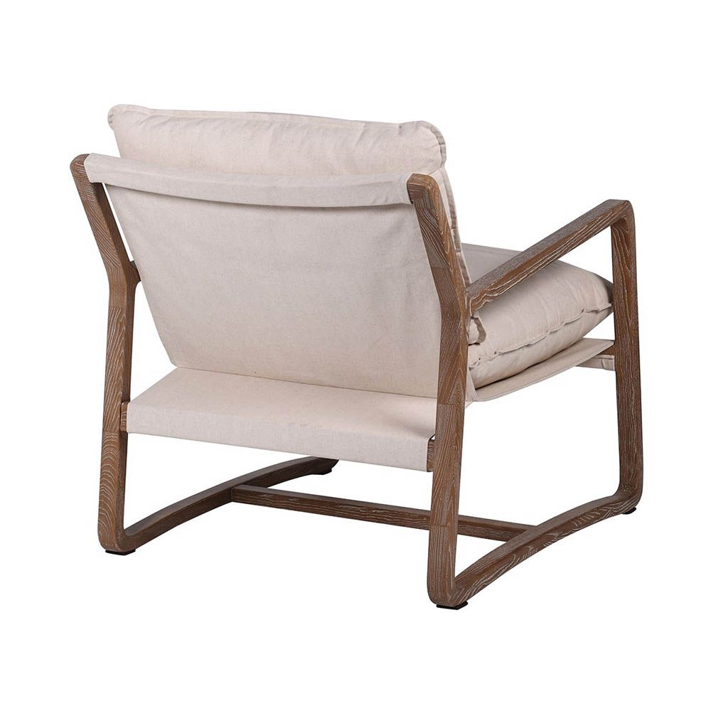 Cosy, neutral armchair with sleek wooden frame and linen seat cushions