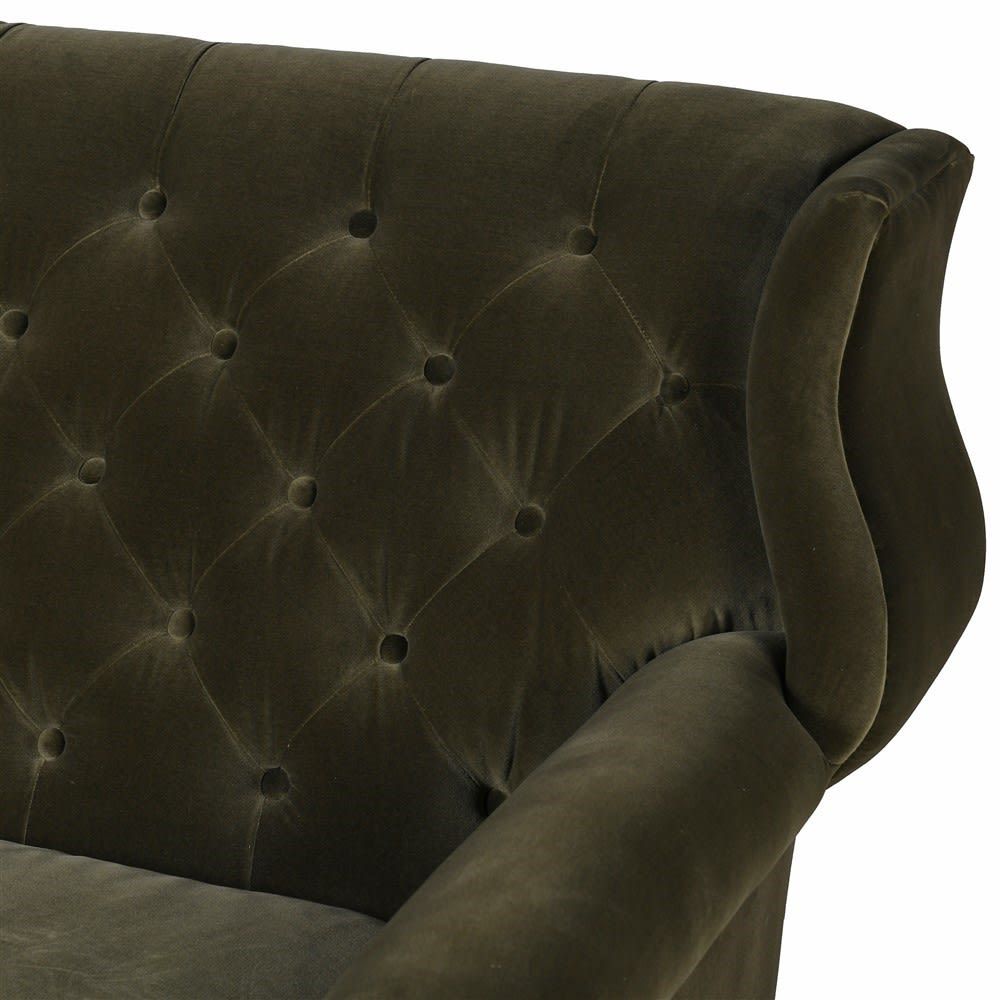 retro olive green velvet sofa with deep-buttoning 