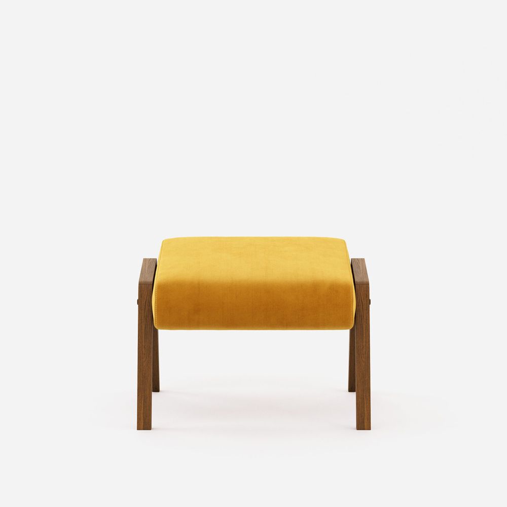 A stylish vibrant velvet ottoman with walnut wood legs 