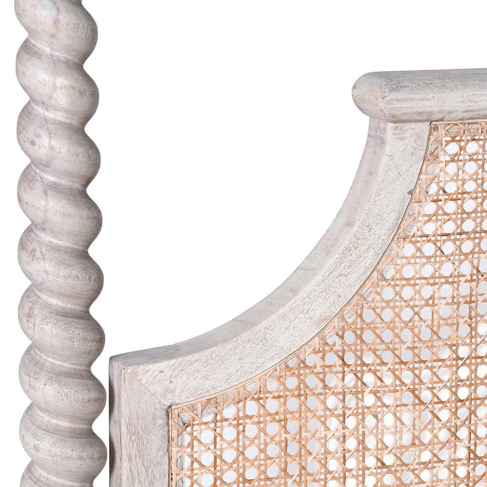 A luxurious acacia and cane 4 poster bed with a rattan headboard