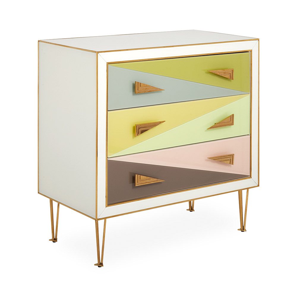 A modern Italian-inspired chest of drawers with angular hardware and brass accents