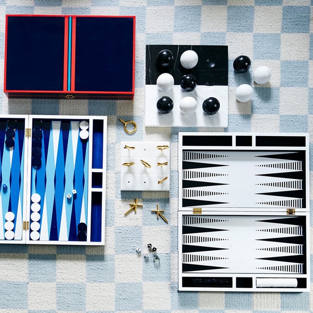 A luxury, monochrome backgammon set by Jonathan Adler with a high-contrast, luxe lacquer and velvet lining