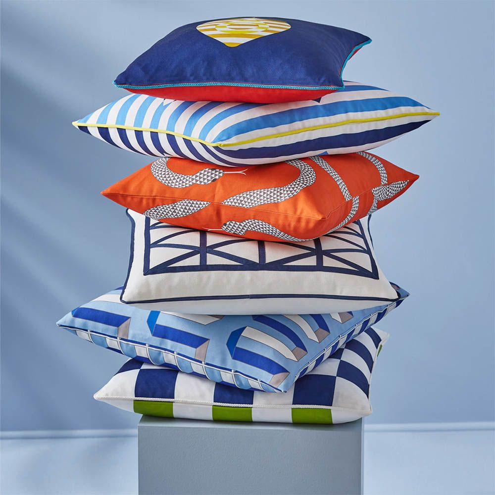 Reversible fruit print cushions, with blue and red sides