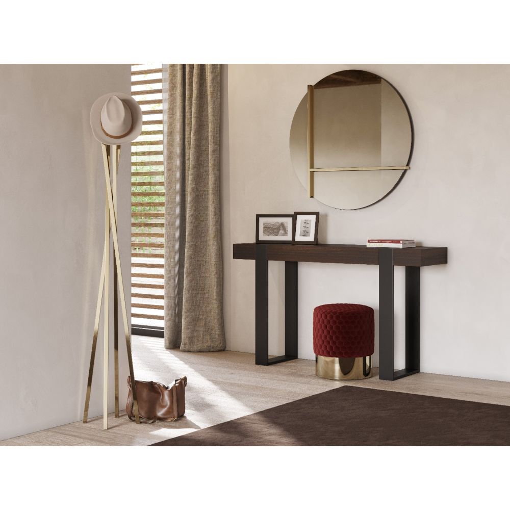 Round mirror with golden steel frame and detailing