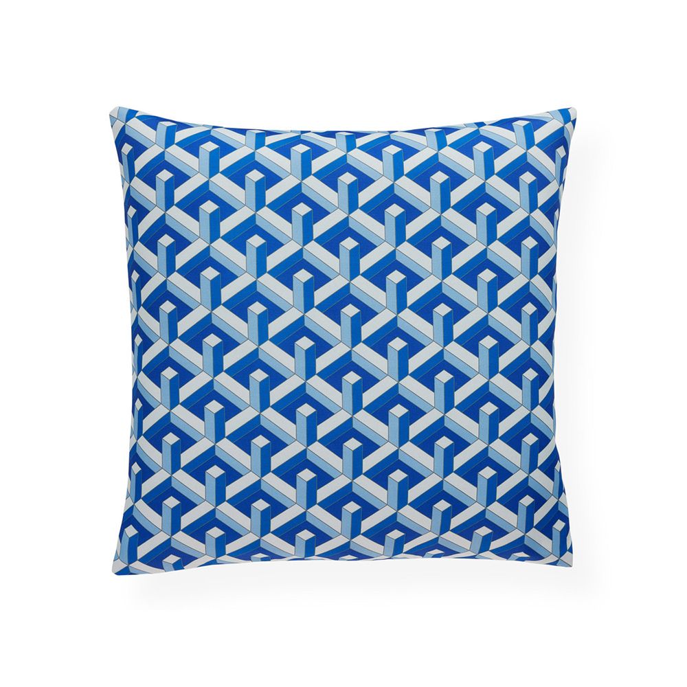 A bold and beautiful blue cushion by Jonathan Adler with a graphic and reversible design