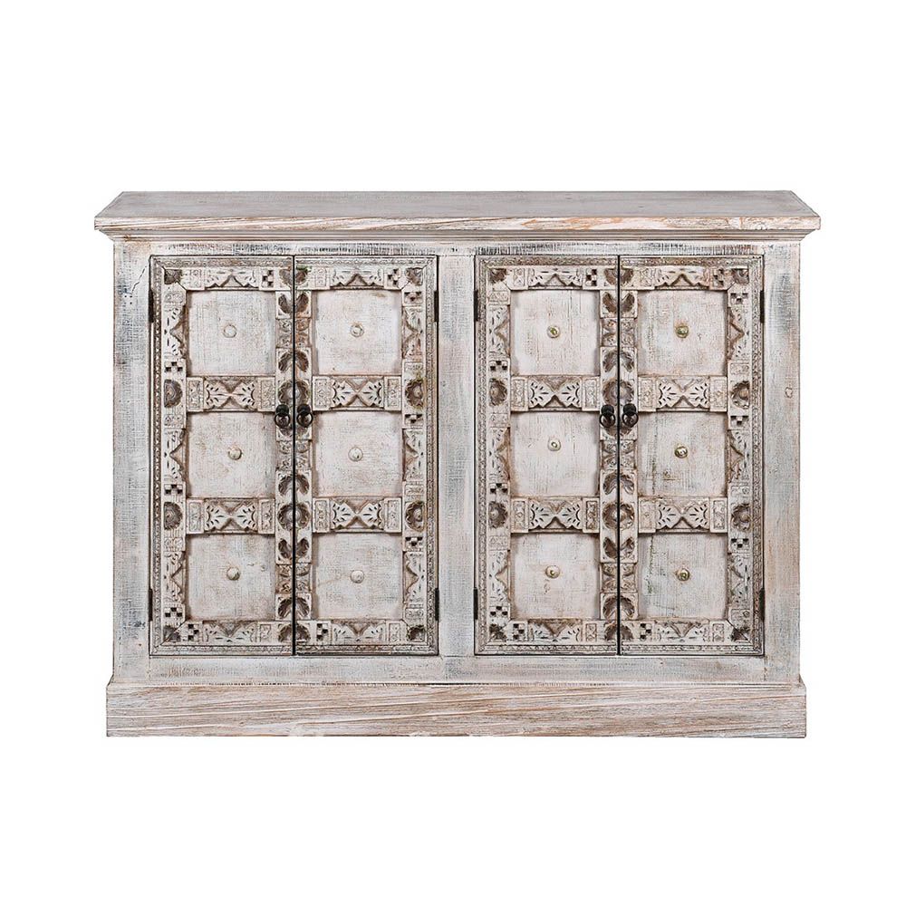 ornate cabinet with two doors in a light-washed wood
