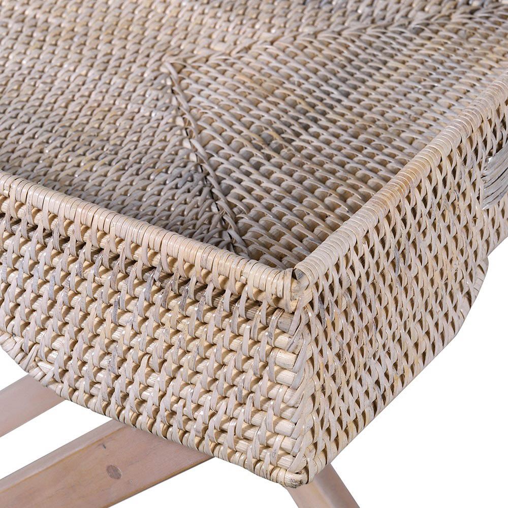 chic and functional woven rattan tray on a stand of mahogany