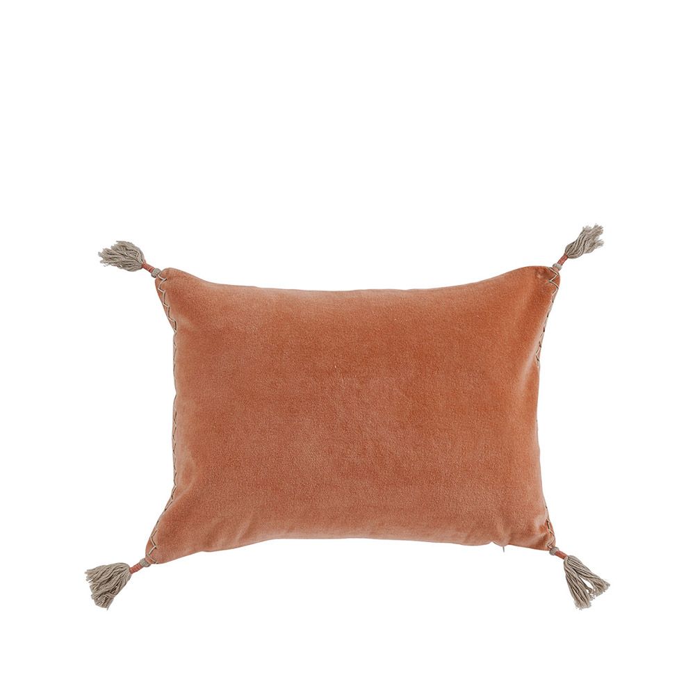 velvety natural cushion with tassels and delicate stitching