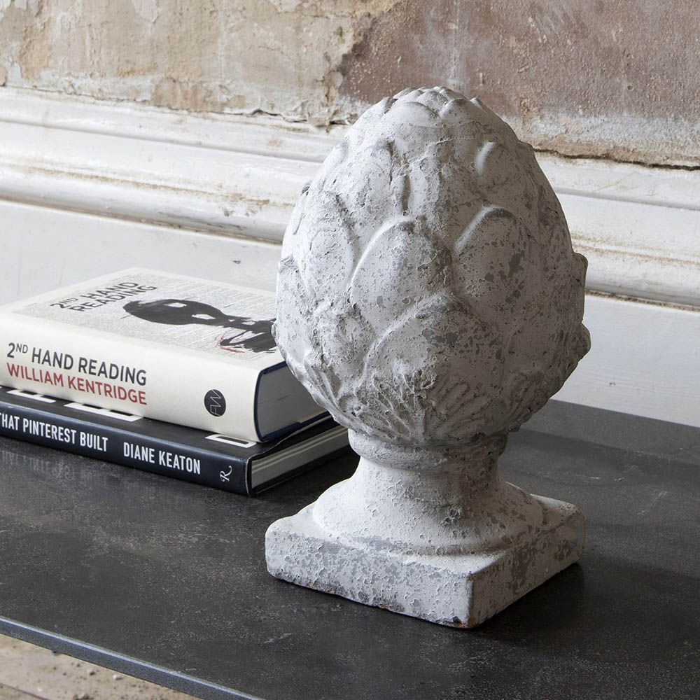Stone finish artichoke sculpture with distressed finish