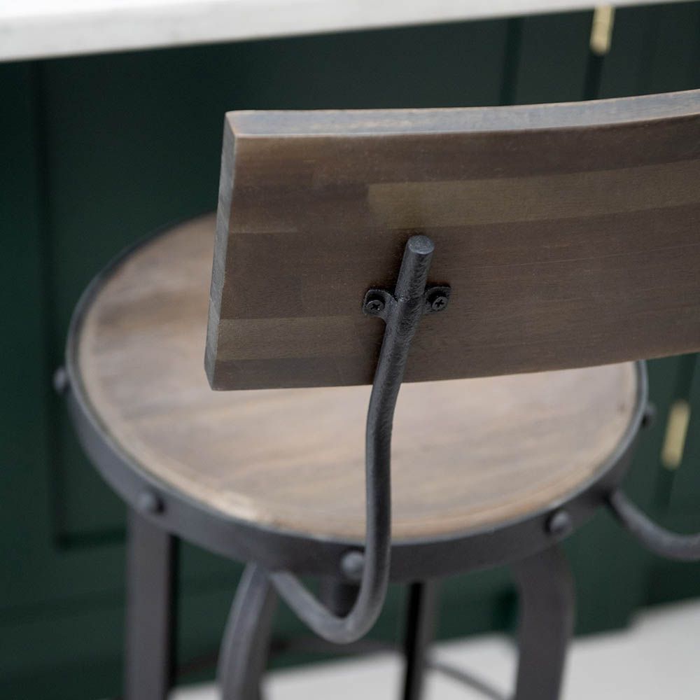 Industrial style bar stool with wooden backrest and seat and dark metal frame