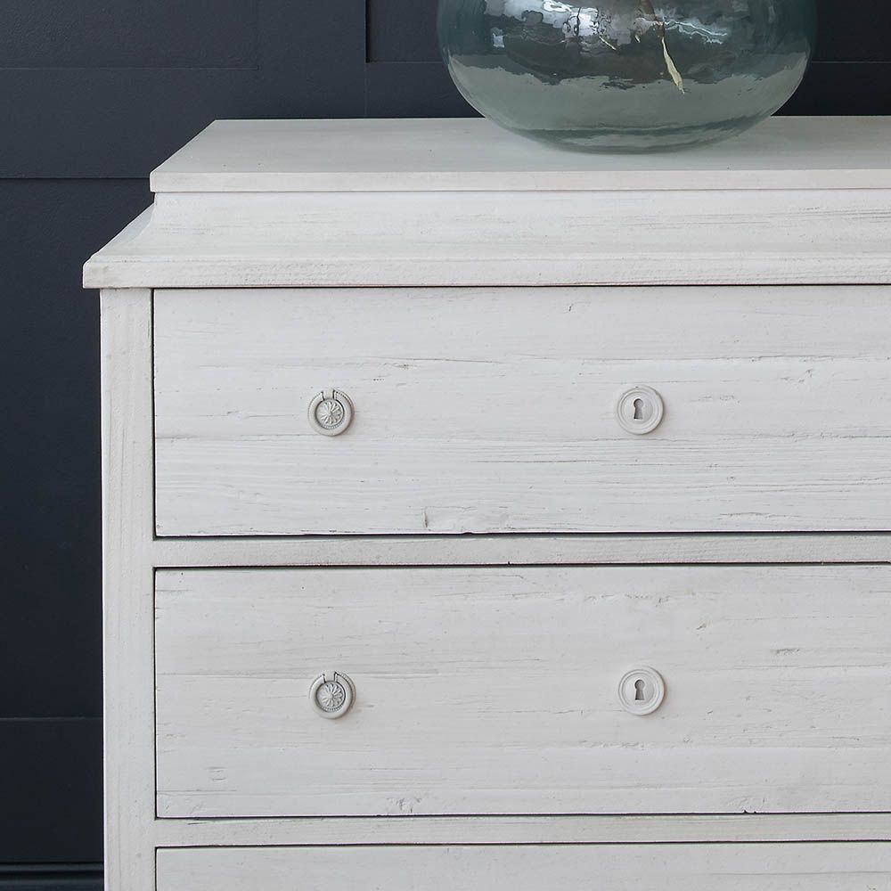 Charming three drawer chest in clean and elegant white washed finish