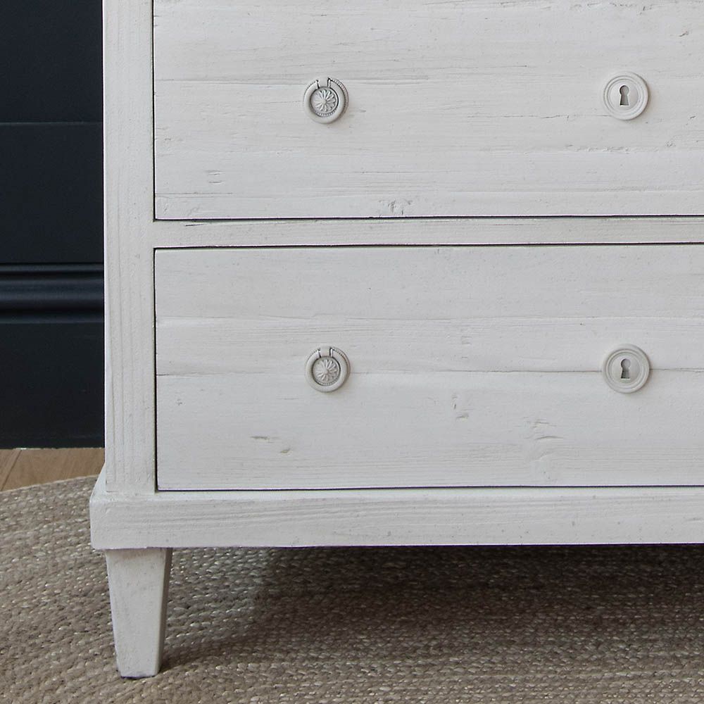 Charming three drawer chest in clean and elegant white washed finish
