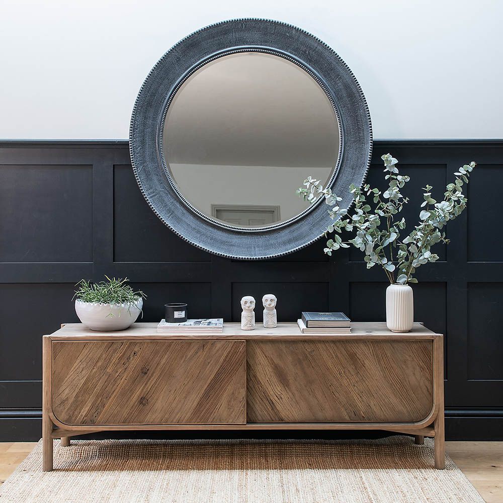 Scandi-inspired sideboard unit with space-saving sliding doors and wood finish