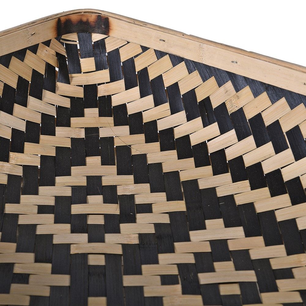 woven bamboo basket with black and natural geometric designs