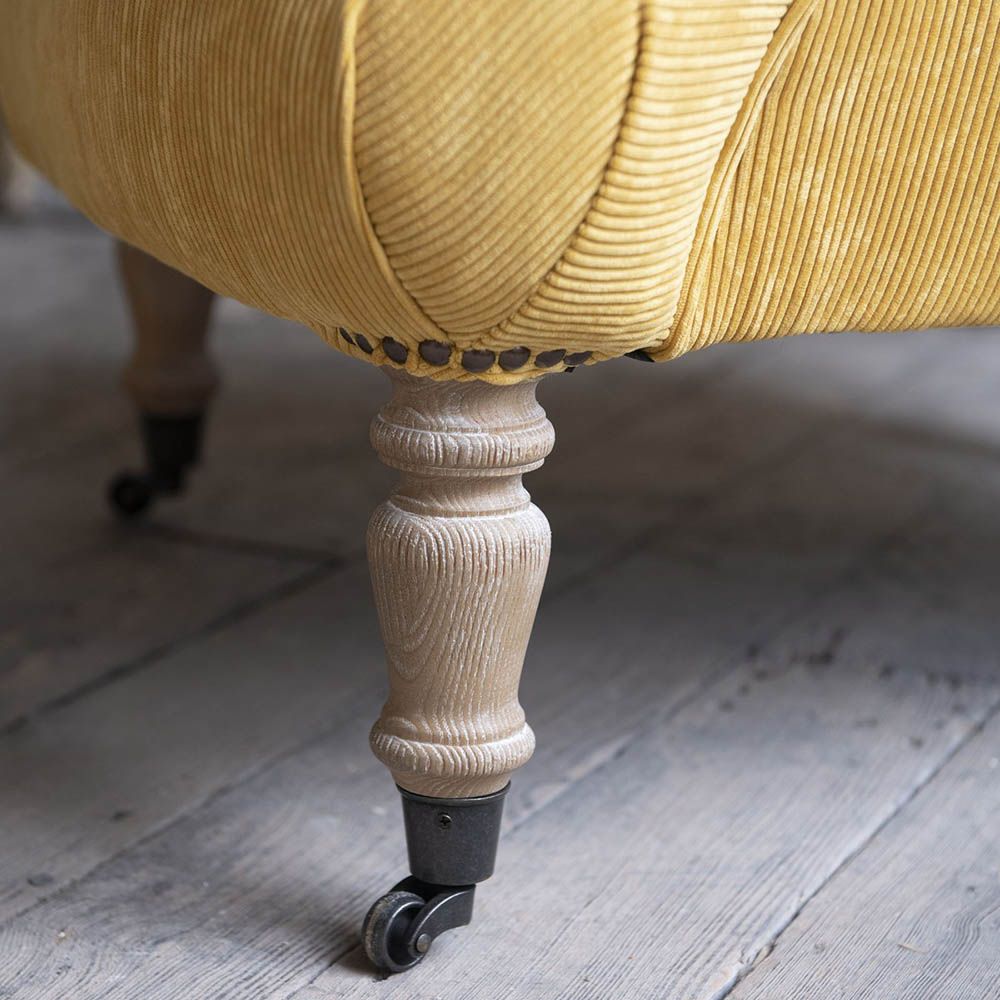 Classical design armchair with yellow cord upholstery 