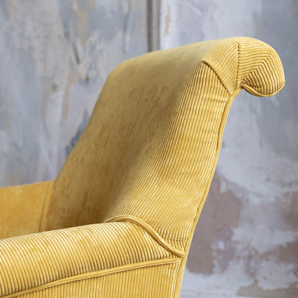 Classical design armchair with yellow cord upholstery 
