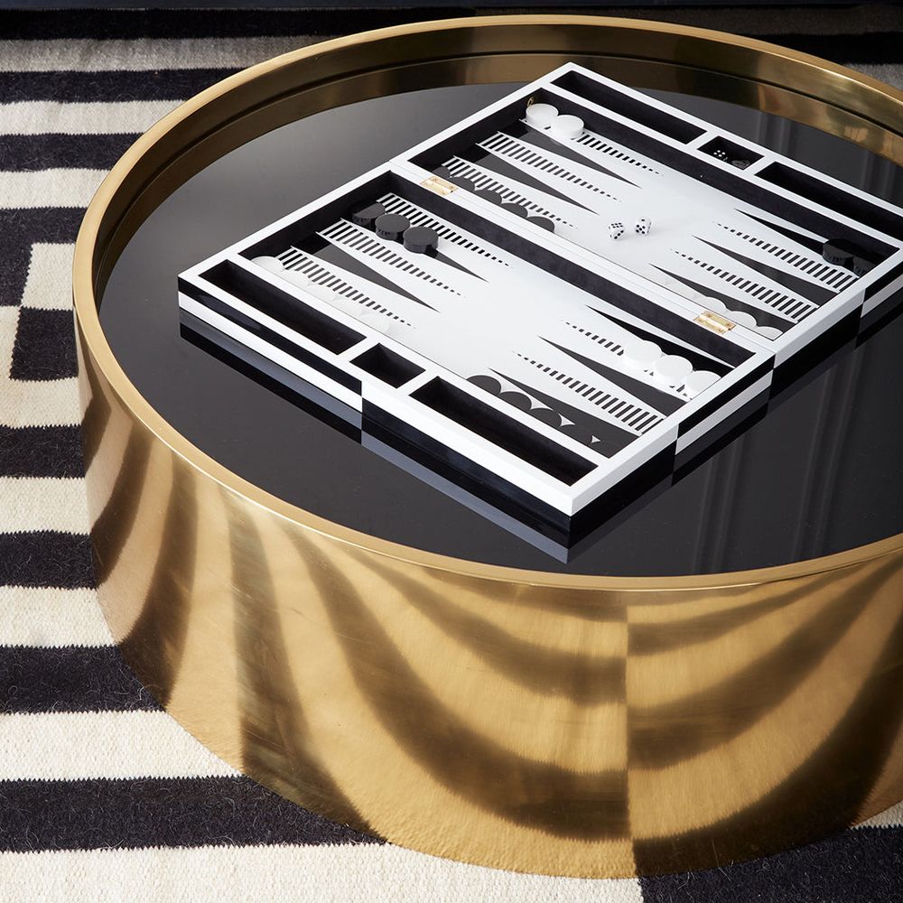 A luxury, monochrome backgammon set by Jonathan Adler with a high-contrast, luxe lacquer and velvet lining