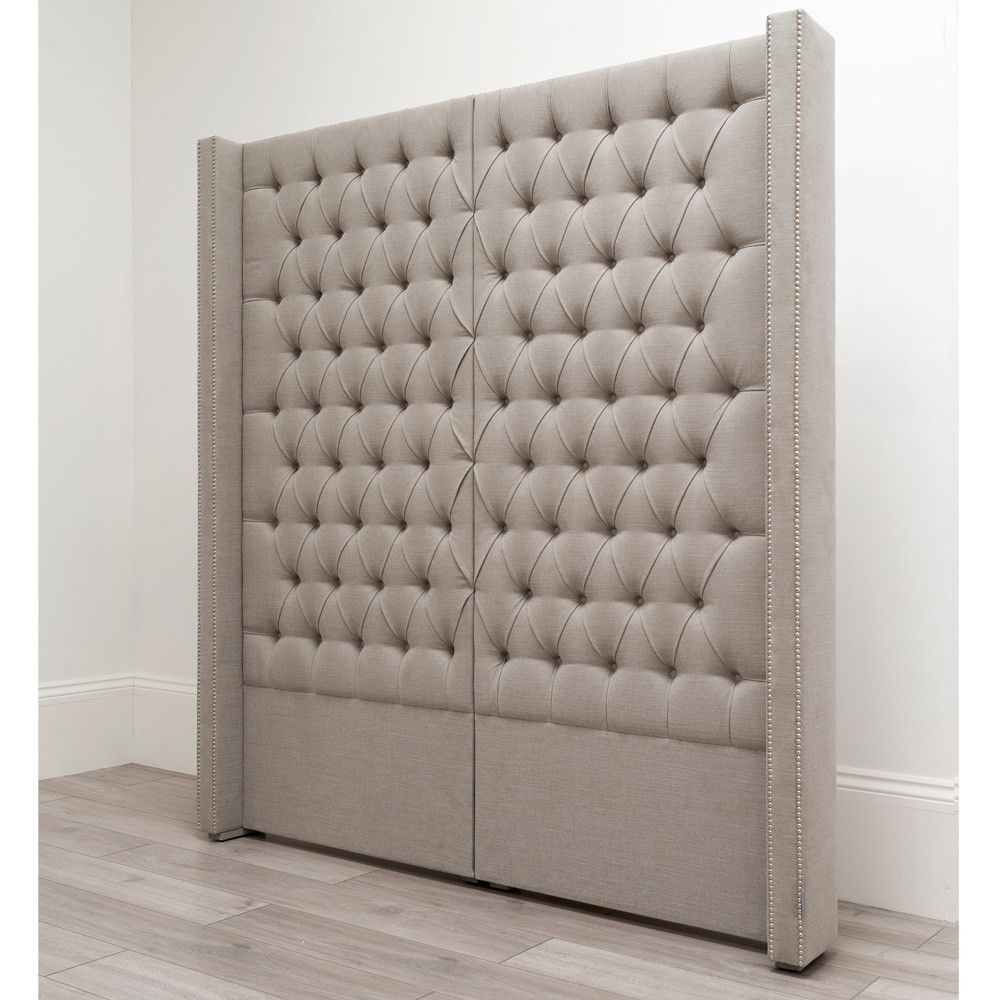 An extravagant deep buttoned headboard