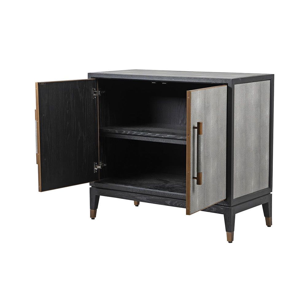 A luxurious small grey faux shagreen cabinet with black and brass accents