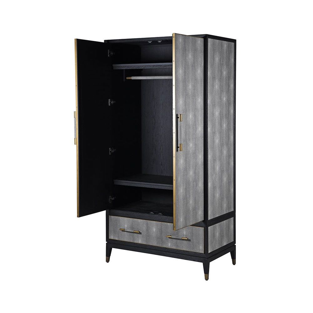 A stunning grey shagreen wardrobe with black and gold accents