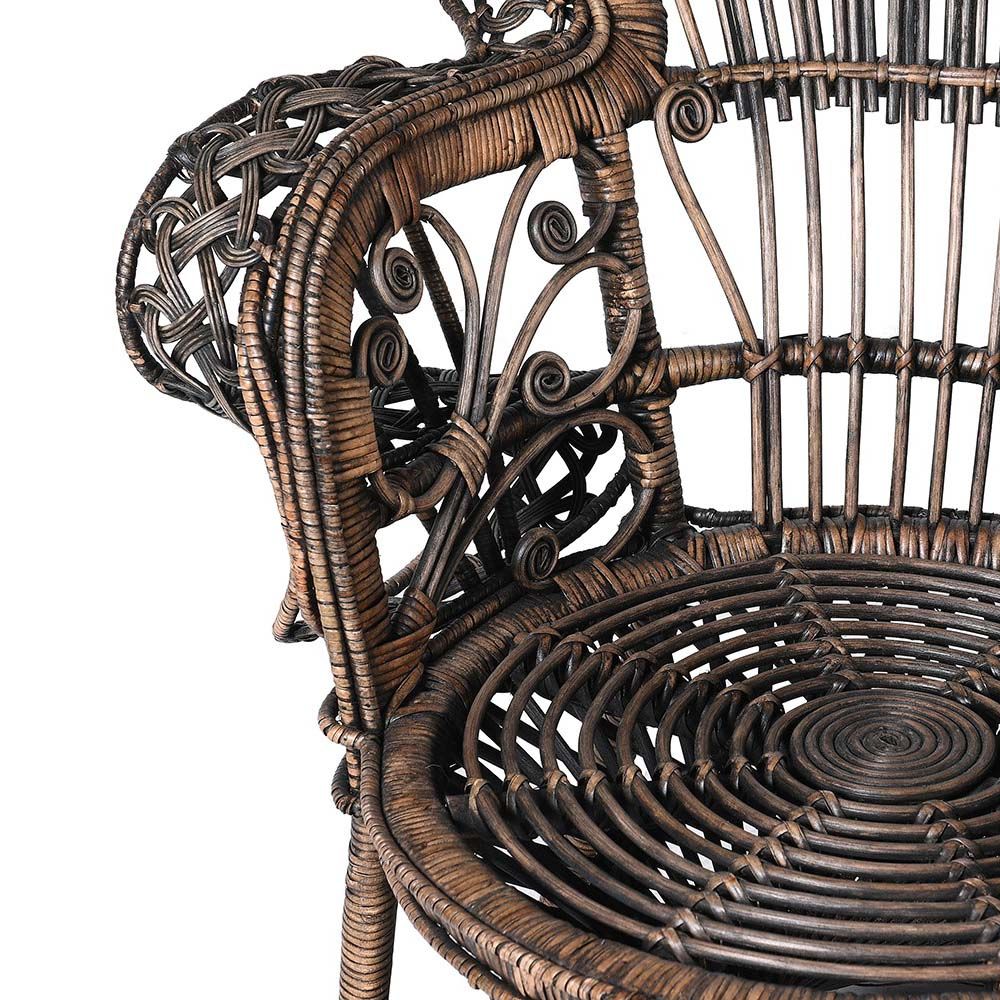 A peacock inspired rattan accent chair