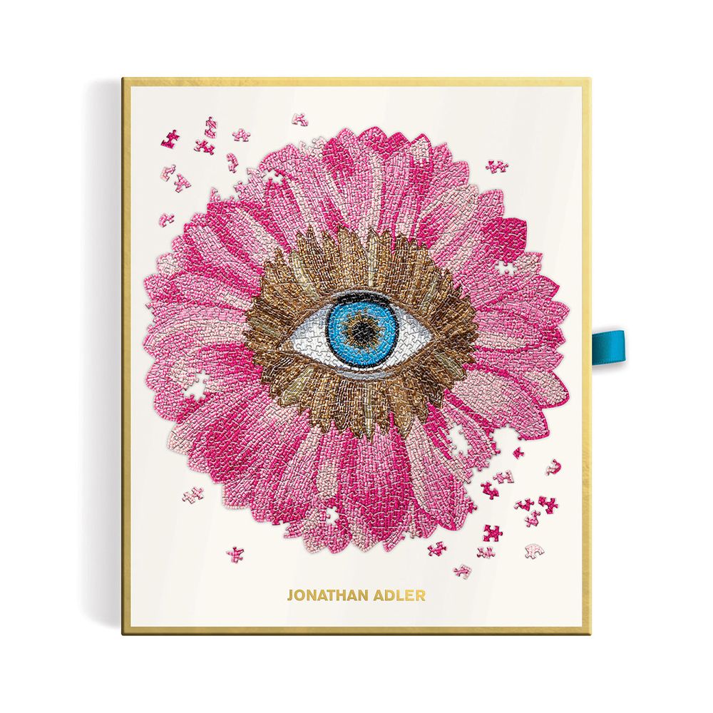 A luxury petals shaped puzzle by Jonathan Adler with 750 pieces and glamorous gold foil accents