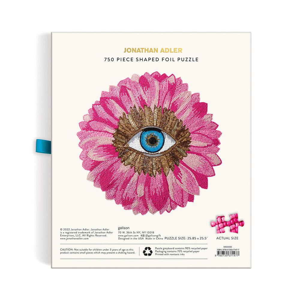 A luxury petals shaped puzzle by Jonathan Adler with 750 pieces and glamorous gold foil accents