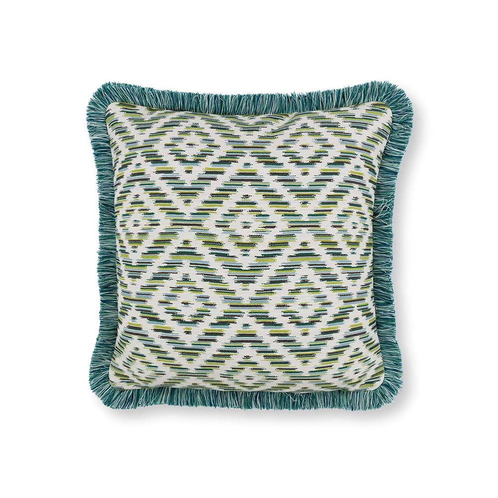 A fringed outdoor cushion with various green hues and chevron details.