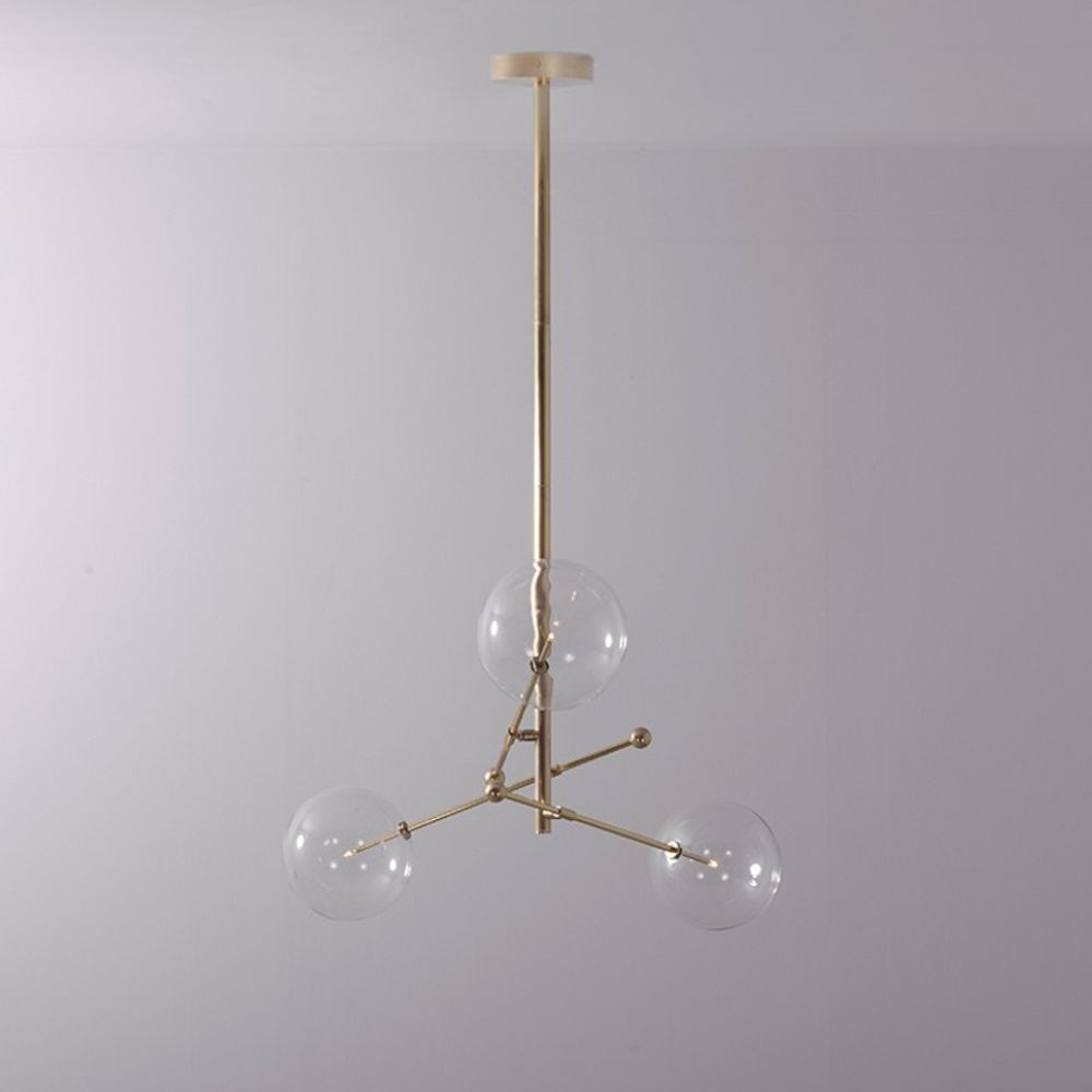 Natural brushed brass industrial style 3 arm chandelier with clear glass globe bulbs