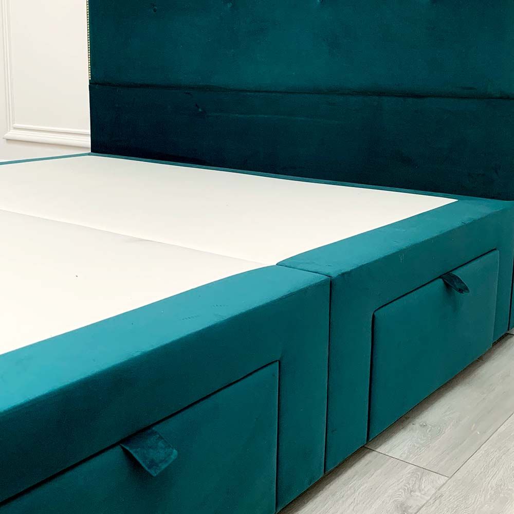 A glamorous gold square studded bed with buttoning detailing and luxury velvet upholstery 