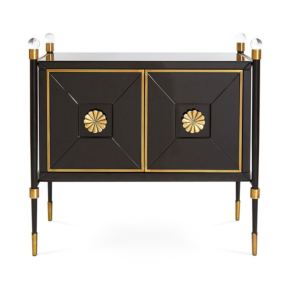 A luxurious Parisian style contemporary cabinet with bras accents and acrylic finials 