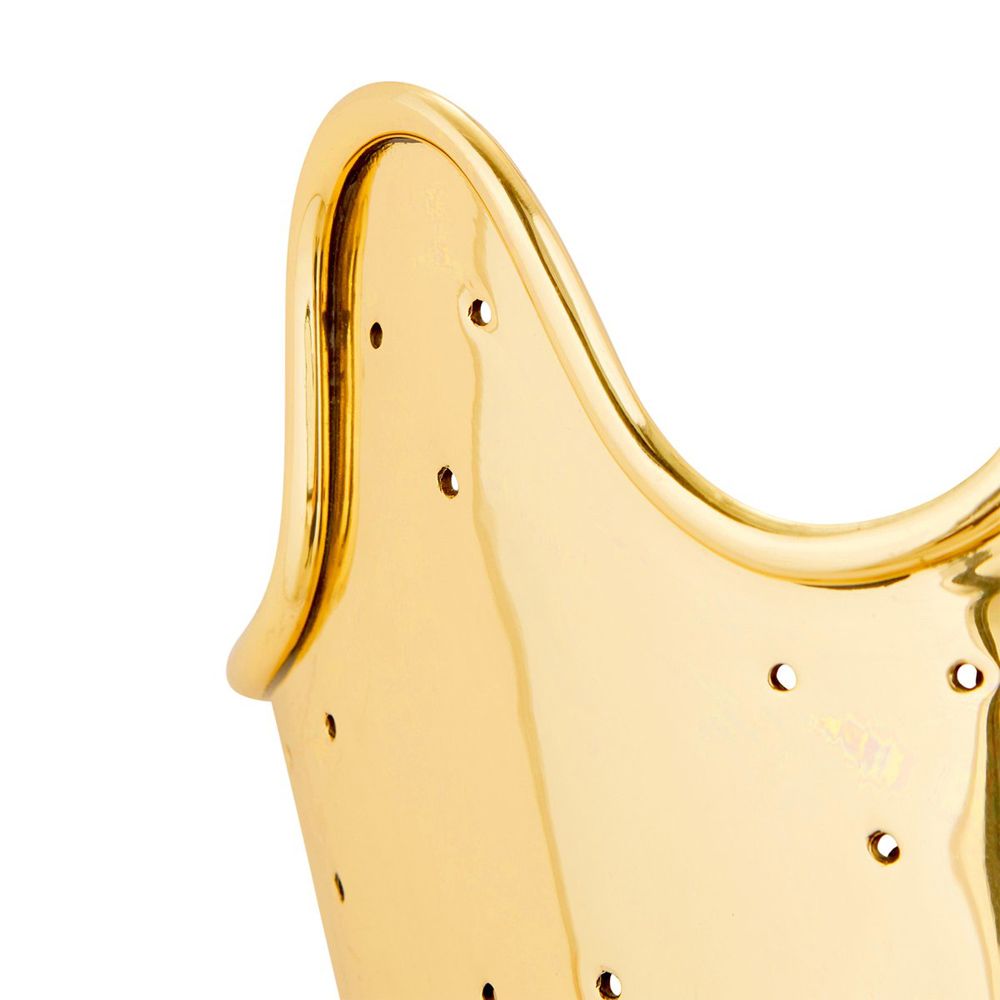 A luxurious solid polished brass wall lamp with a perforated and lacquered finish
