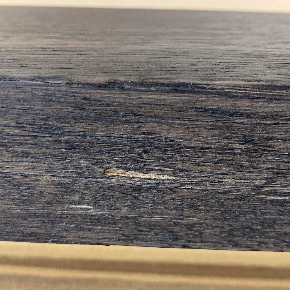 Minor scratch to the side of the table