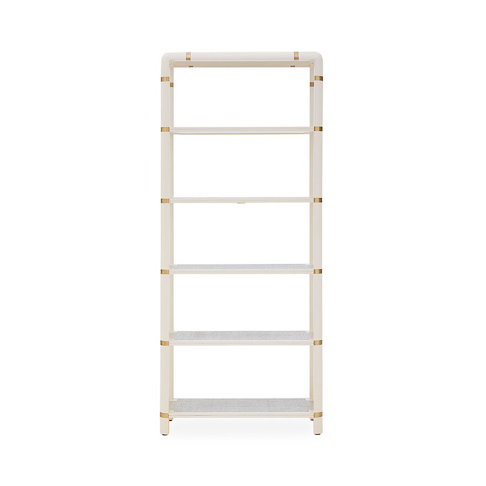 A luxurious Ivory lacquer-coated mahogany etagere with brass cuff details