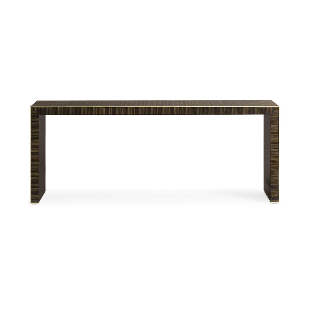 A luxury console table by Caracole with a glamorous gold border