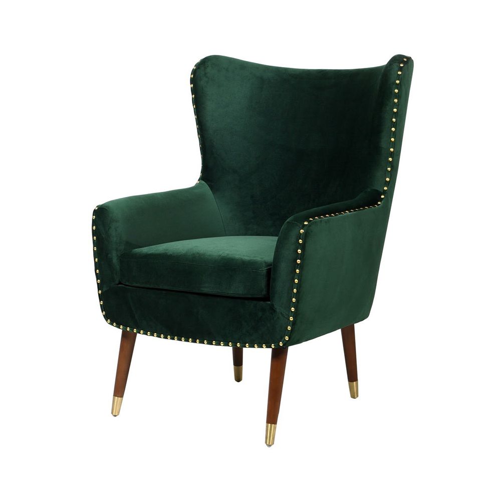 A luxurious green velvet armchair with brass studs and brown legs with brass caps