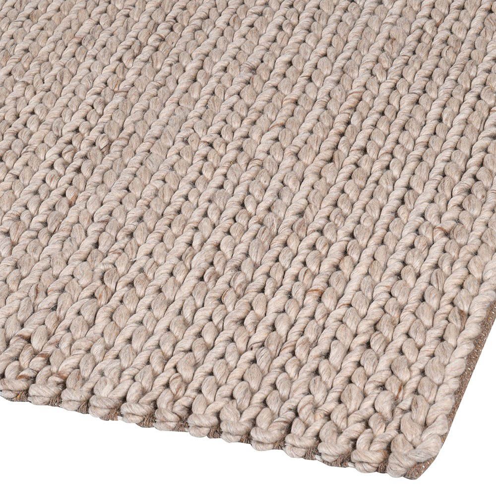 Cosy and rustic style woven rug in beige