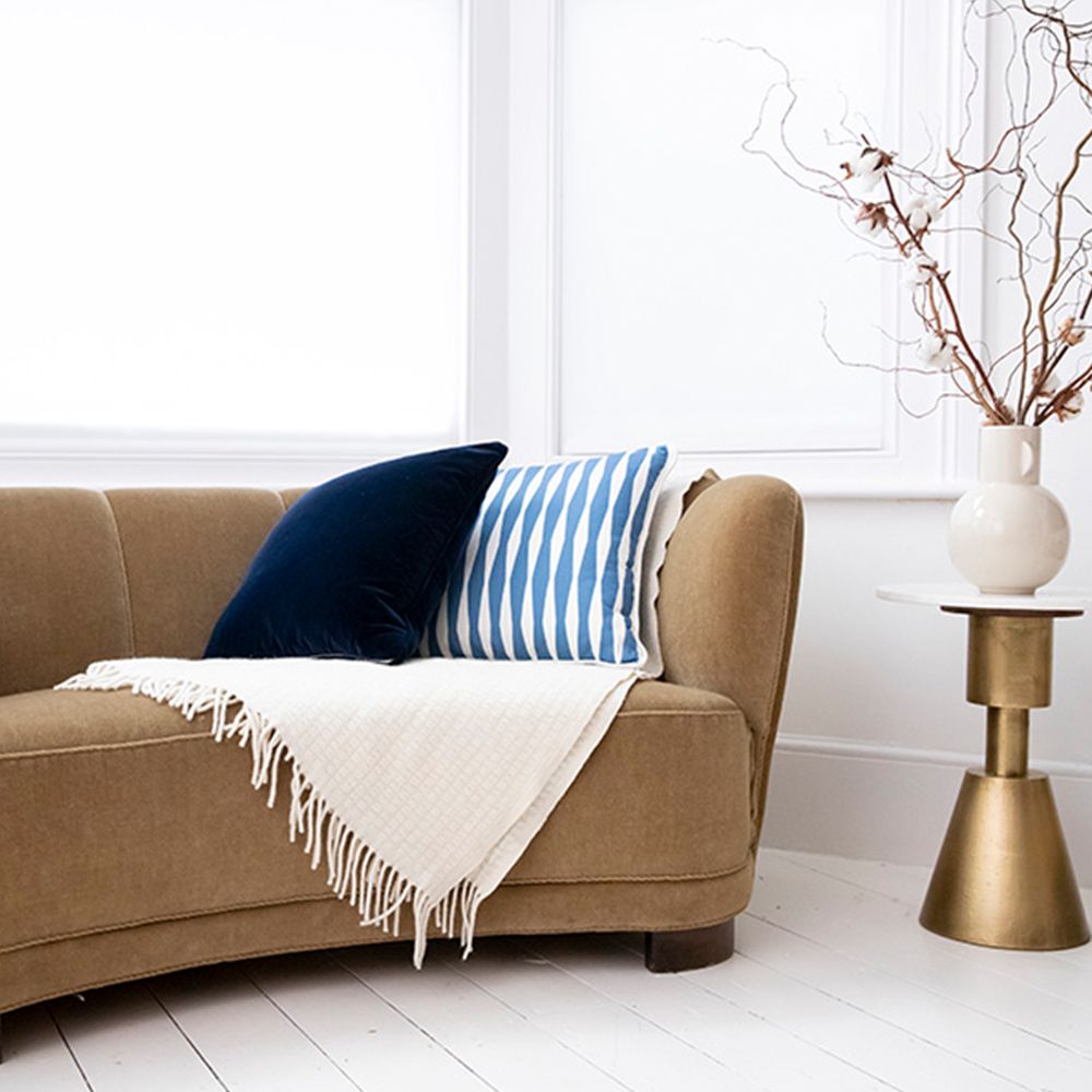 A divine dark blue velvet cushion 