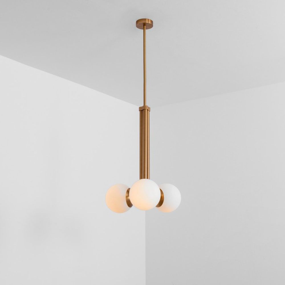 A luxurious natural brass ceiling pendant inspired by early century and industrial style 
