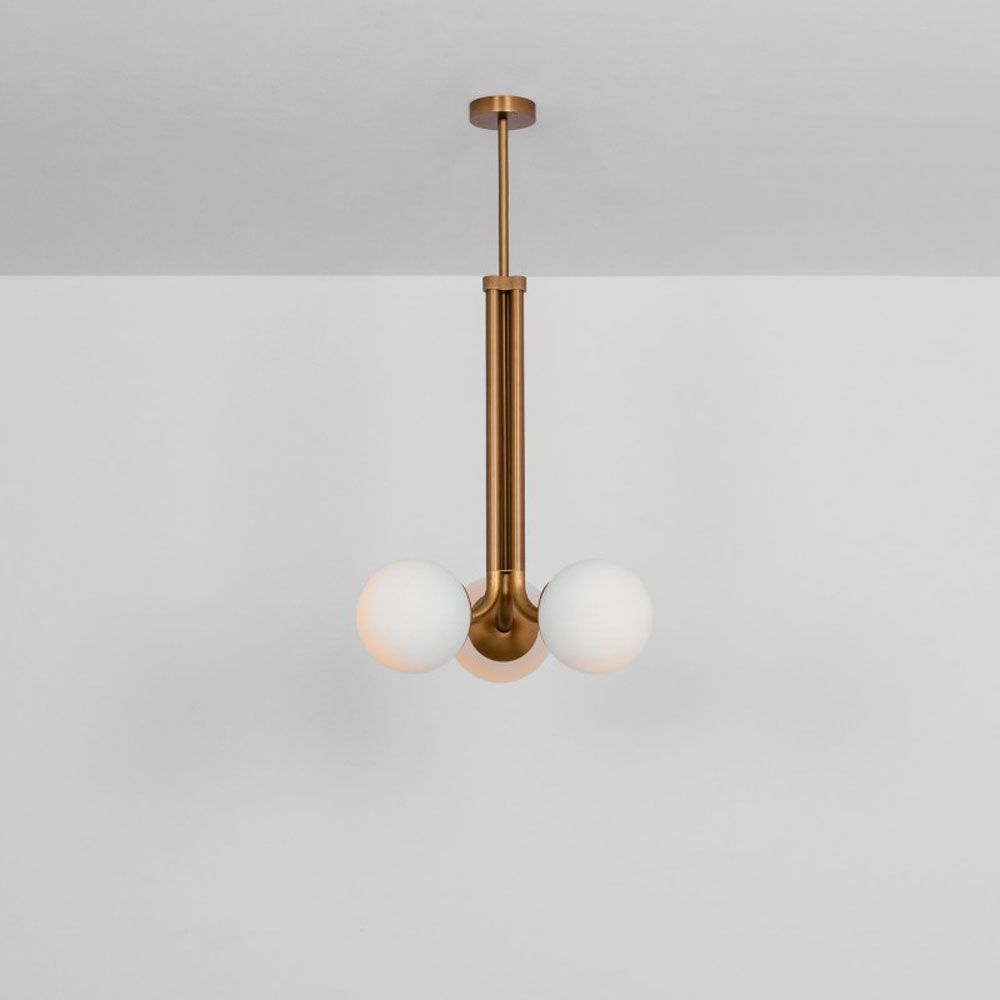 A luxurious natural brass ceiling pendant inspired by early century and industrial style 
