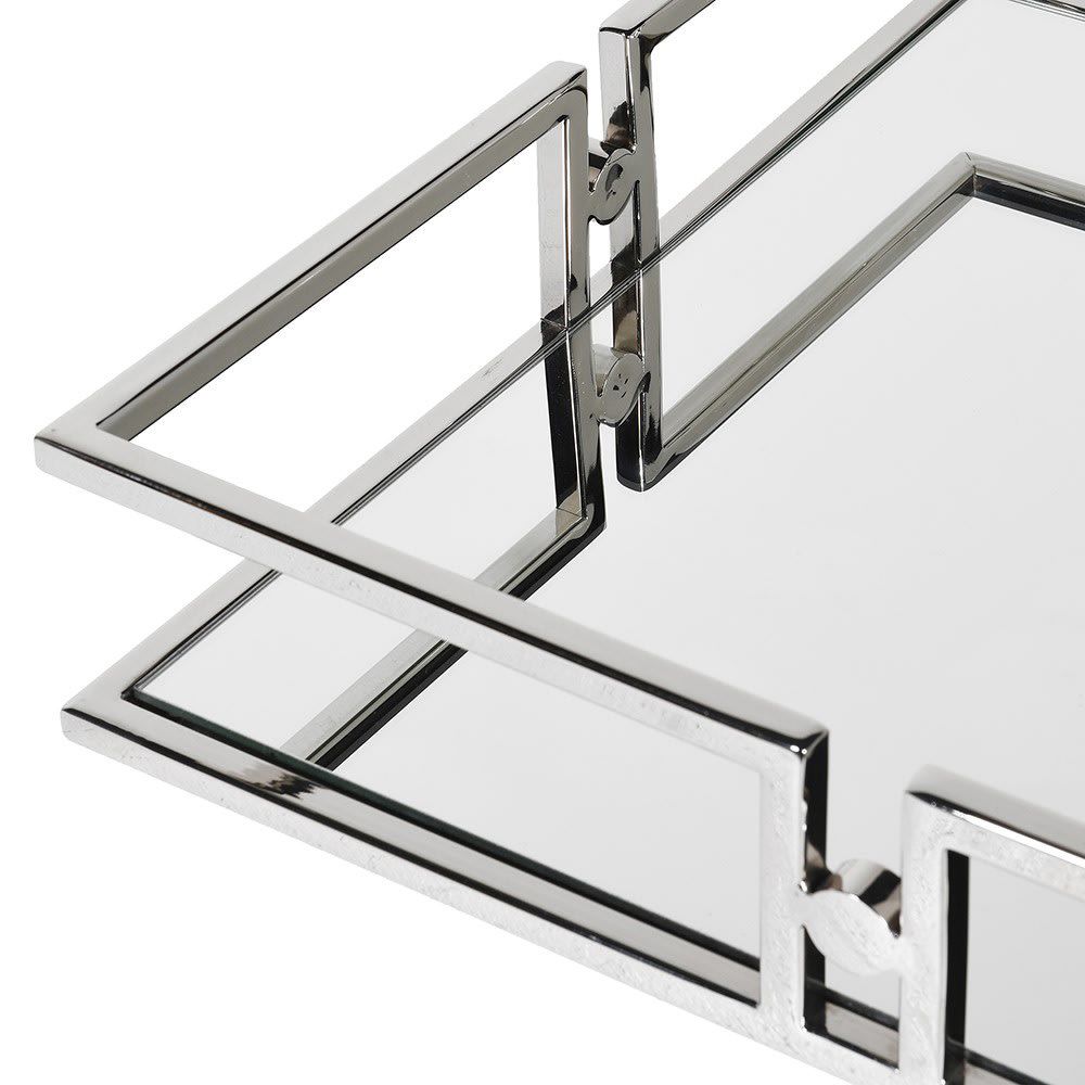 A glamorous mirrored nickel tray