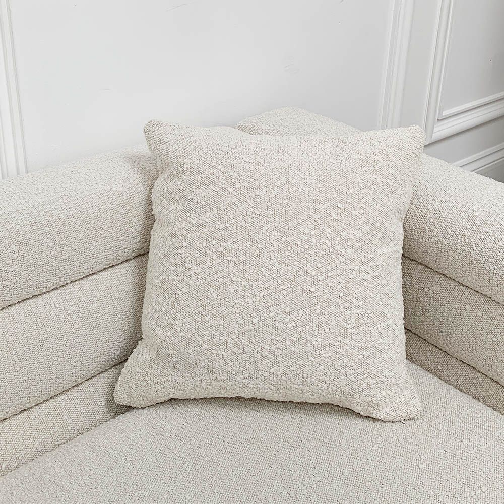 Pair of boucle cushions with some dirt marks
