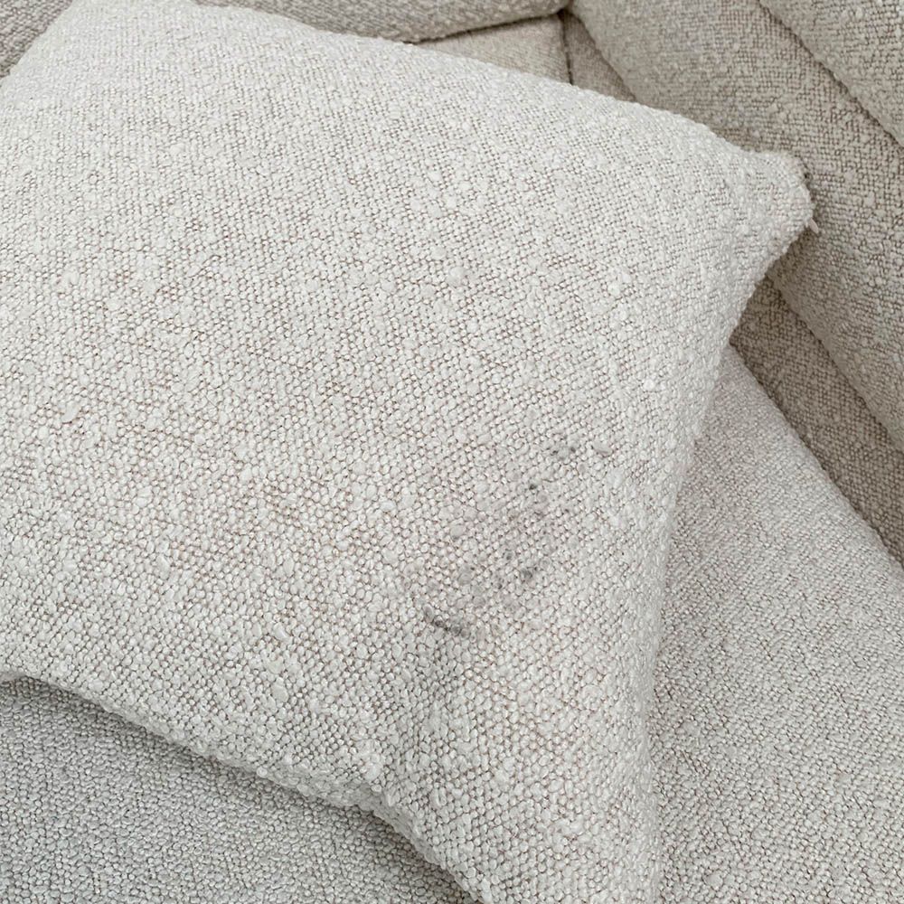 Pair of boucle cushions with some dirt marks