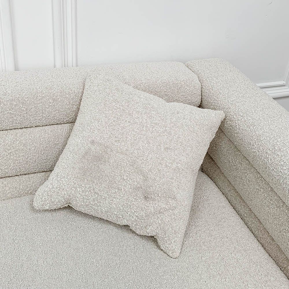 Pair of boucle cushions with some dirt marks