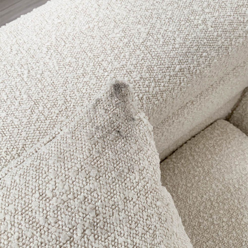 Pair of boucle cushions with some dirt marks