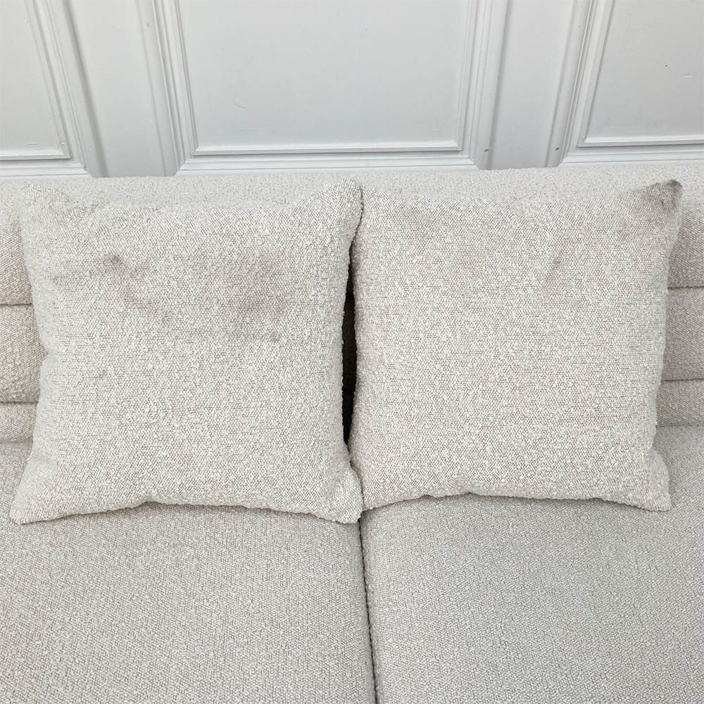 Pair of boucle cushions with some dirt marks