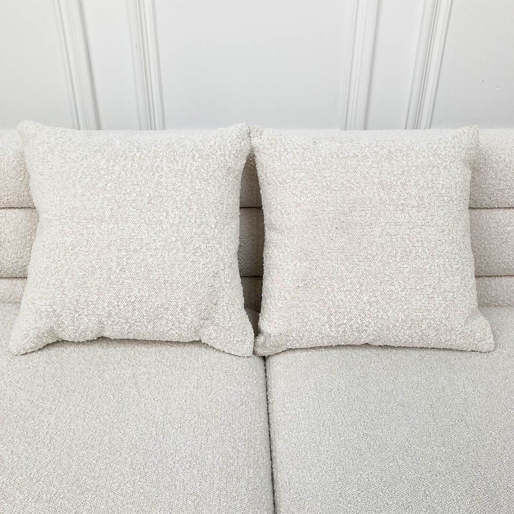 Pair of boucle cushions with some dirt marks
