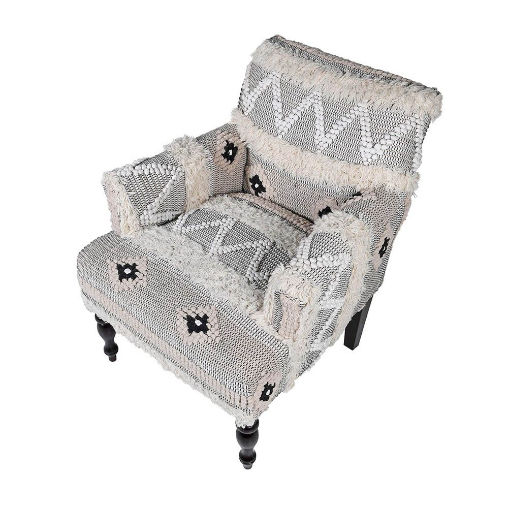 Bohemian-style patterned accent chair with tufted wool details 