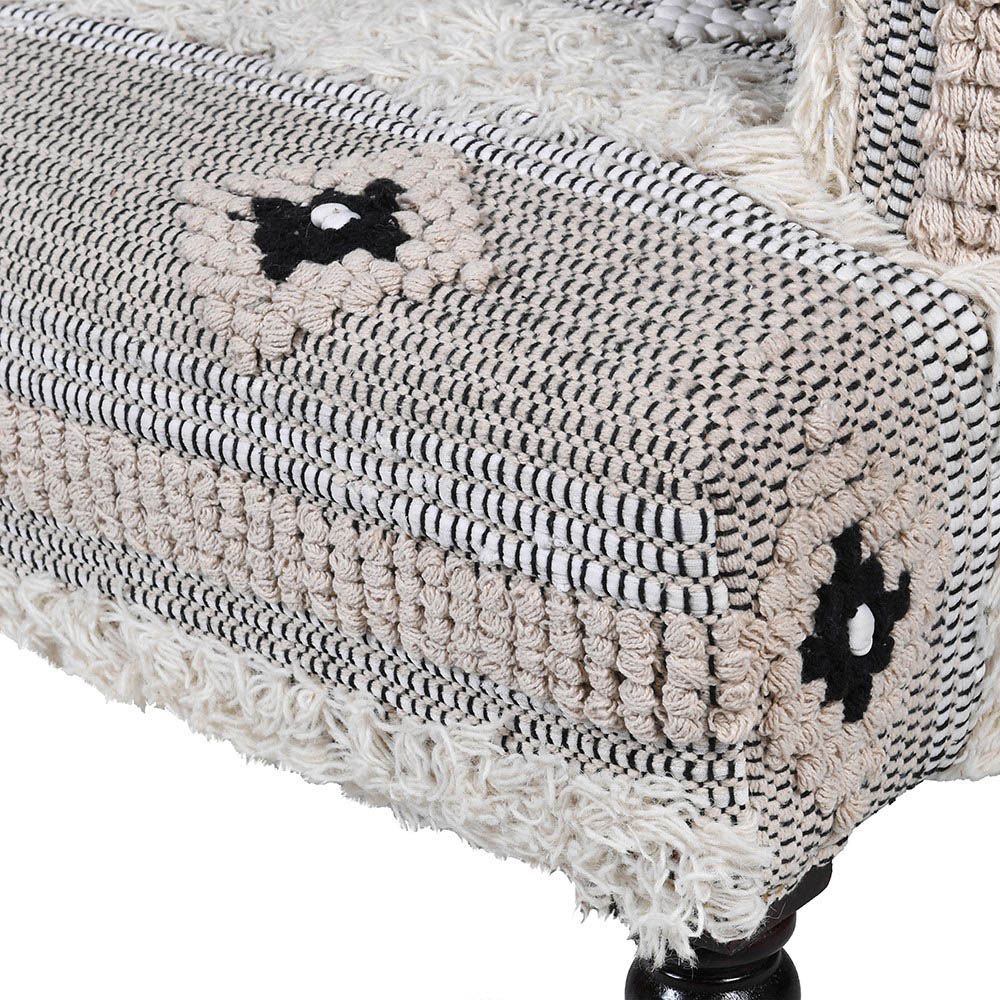 Bohemian-style patterned accent chair with tufted wool details 